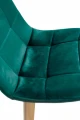 krzeslo-colin-tapicerowane-welurowe-zielone-siedzisko.webp