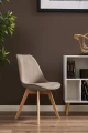 krzeslo-bari-tapicerowane-welurowe-bezowe-mebel-wizualizacja-w-pomieszczeniu.webp