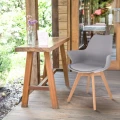 krzeslo-skandynawskie-orlean-plastikowe-ekoskora-szare-marka-jumi-wizualizacja-na-tarasie.webp