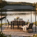 ogrodowa-tarasowa-pergola-wiata-do-elewacji-stalowa-240-cm-marka-jumi-wizualizacja-jezioro.webp