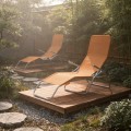 magnific__photo-an-orange-mesh-lounge-chair-with-a-metal-fra__10849.jpeg