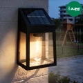 lampa-solarna-kinkiet-1-led-cieply-bialy-czarna-elewacja-ogrod.webp