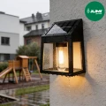 kinkiet-solarny-zewnetrzny-czarny-1-led-cieply-bialy-deszcz.webp