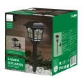 lampa-solarna-1-led-2w1-wbijana-kinkiet-zimny-bialy-opakowanie.webp