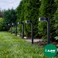 zestaw-lamp-solarnych-1-led-12-sztuk-neutralny-lampy-w-ogrodzie-dzien.webp