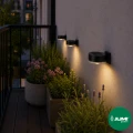 zestaw-lamp-solarnych-12-led-wbijana-kinkiet-4-sztuki-cieply-bialy-kinkiet-balkon.webp