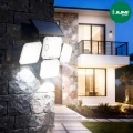 lampa-solarna-296-led-reflektor-zimny-bialy-sciana-kamienna.webp