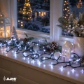 lampki-led-zimny-bialy-parapet-swieta-lampion-domki.webp