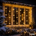 kurtyna-led-sniezynki-elewacja-domu.webp
