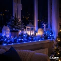 lampki-led-niebieskie-parapet-swieta.webp