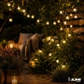 lampki-led-ogrod-girlanda-na-drzewie.webp